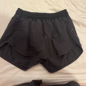 size eight lululemon long hotty hot shorts in black